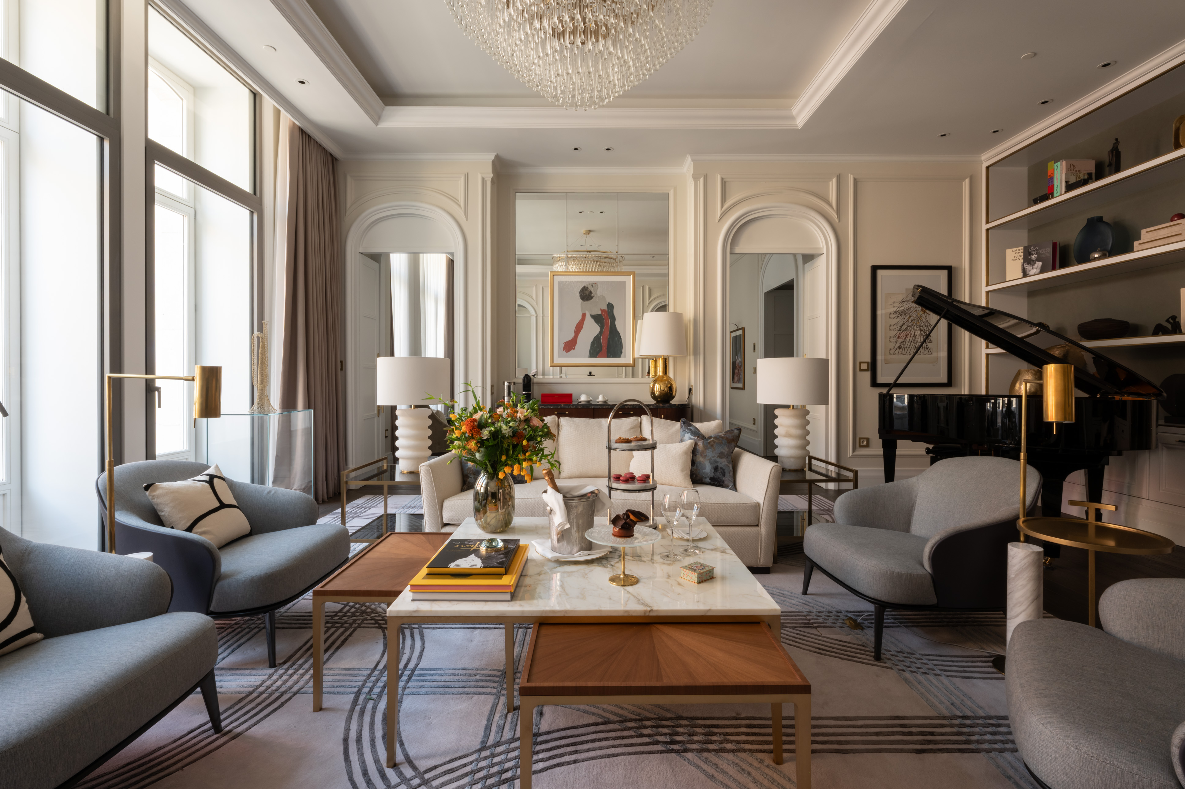 Royal Heritage Suite at Corinthia Brussels: living space with amenities and grand piano