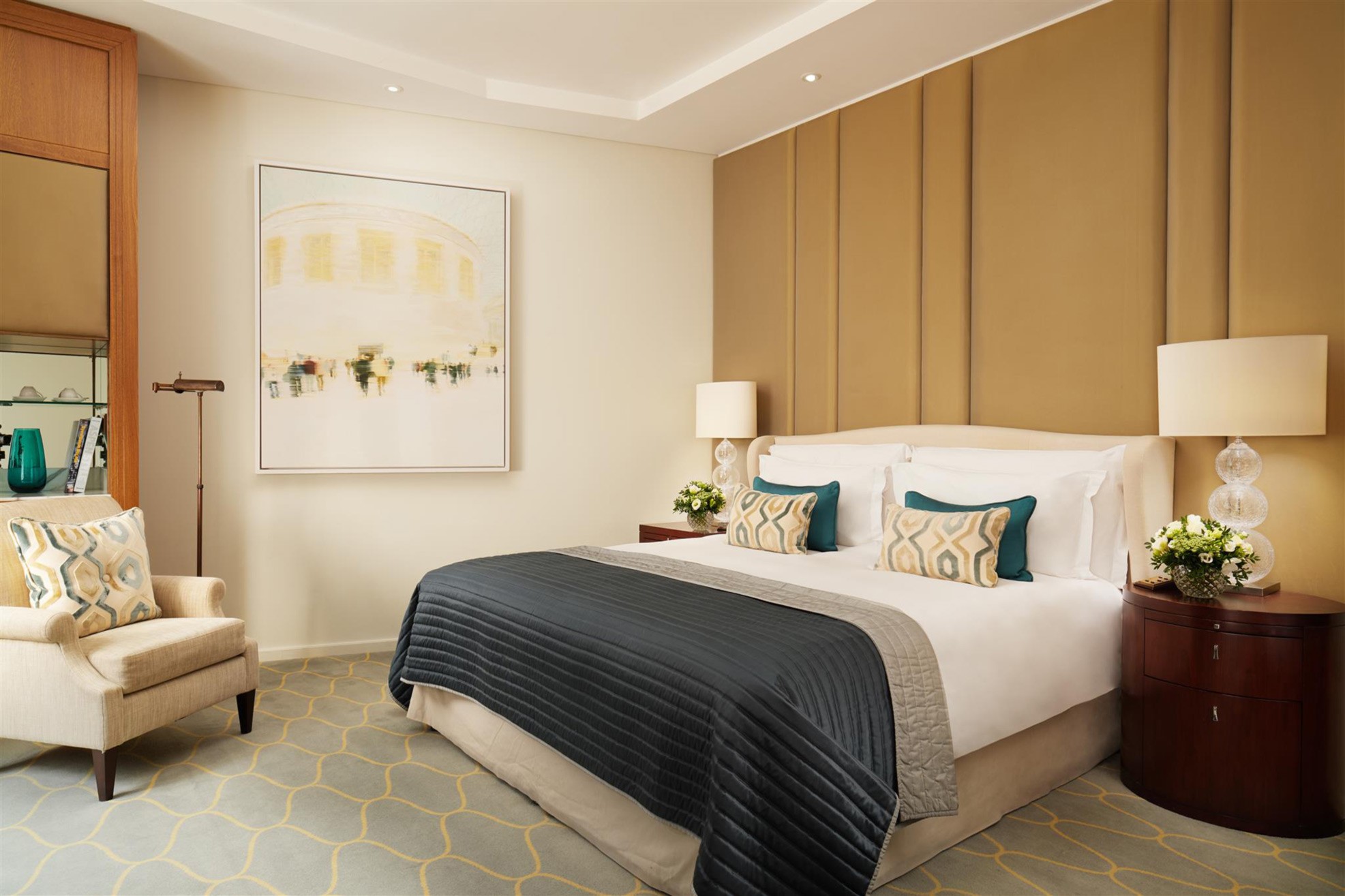 Superior Room bedroom with chair 