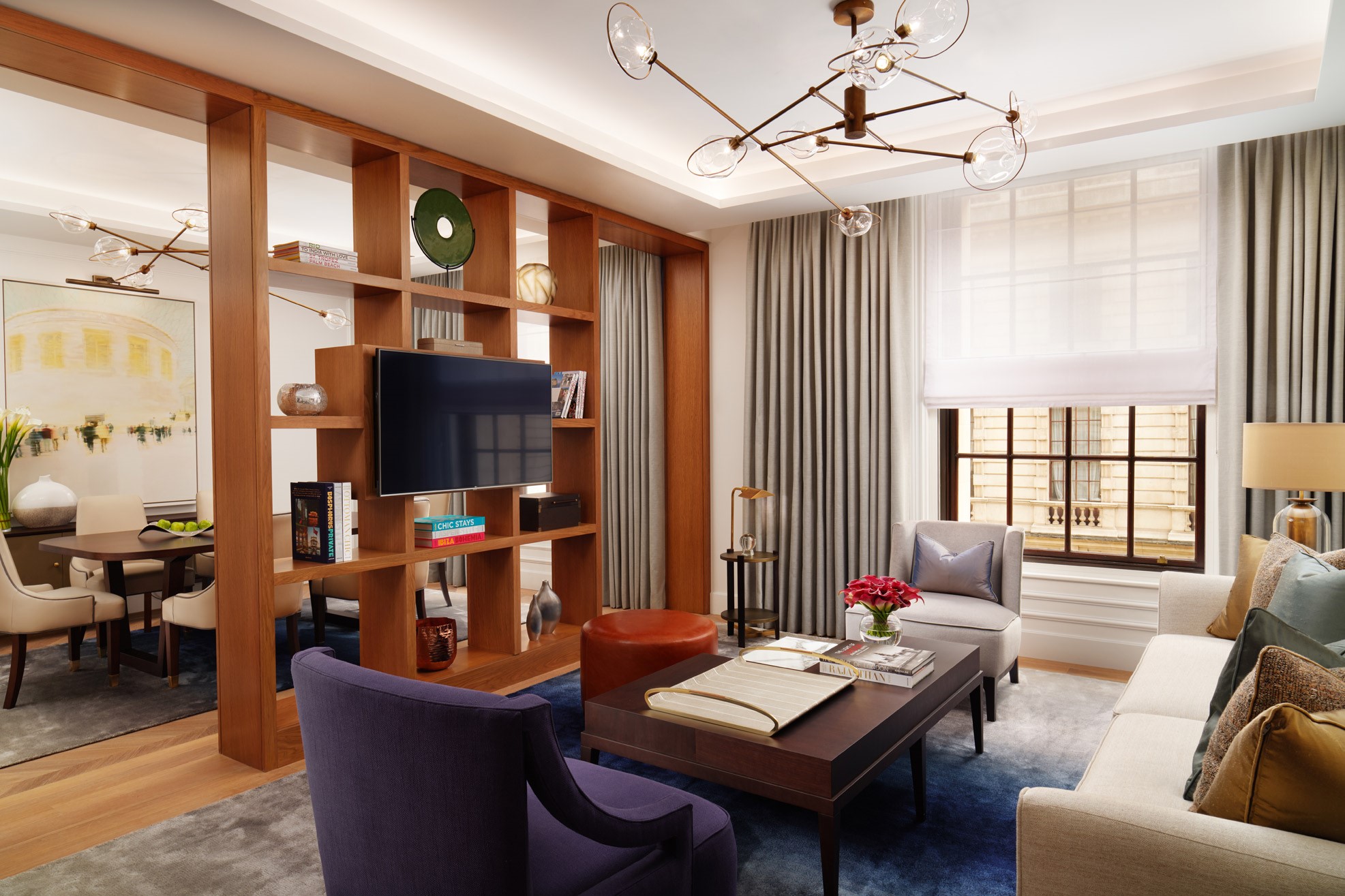 Living room with views into the dining area