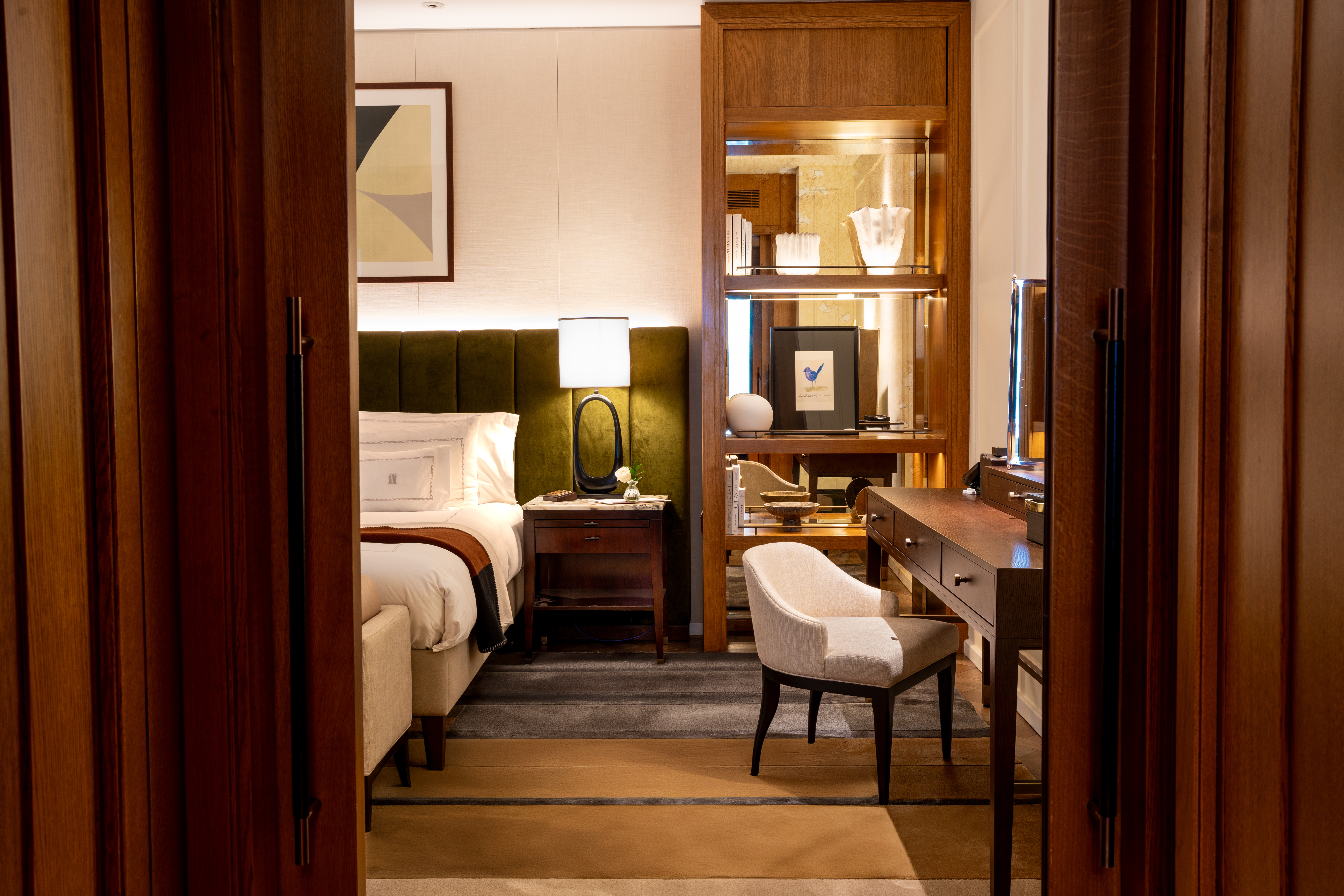 Glance inside a luxury suite bedroom at Corinthia London near iconic London landmarks.
