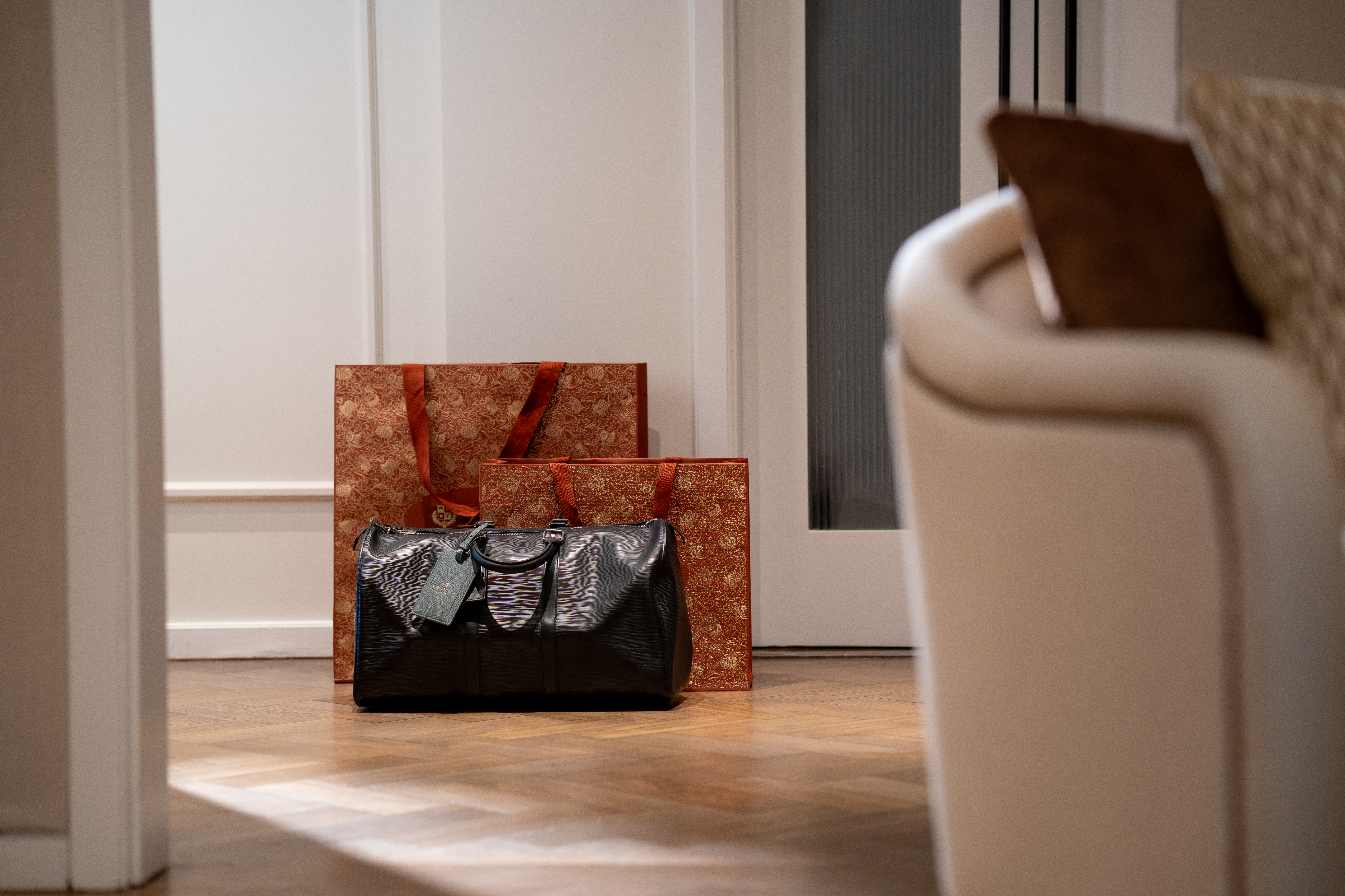 Retail therapy purchases from areas like Westminster or Soho, placed within one of the Luxury Suites at Corinthia London.