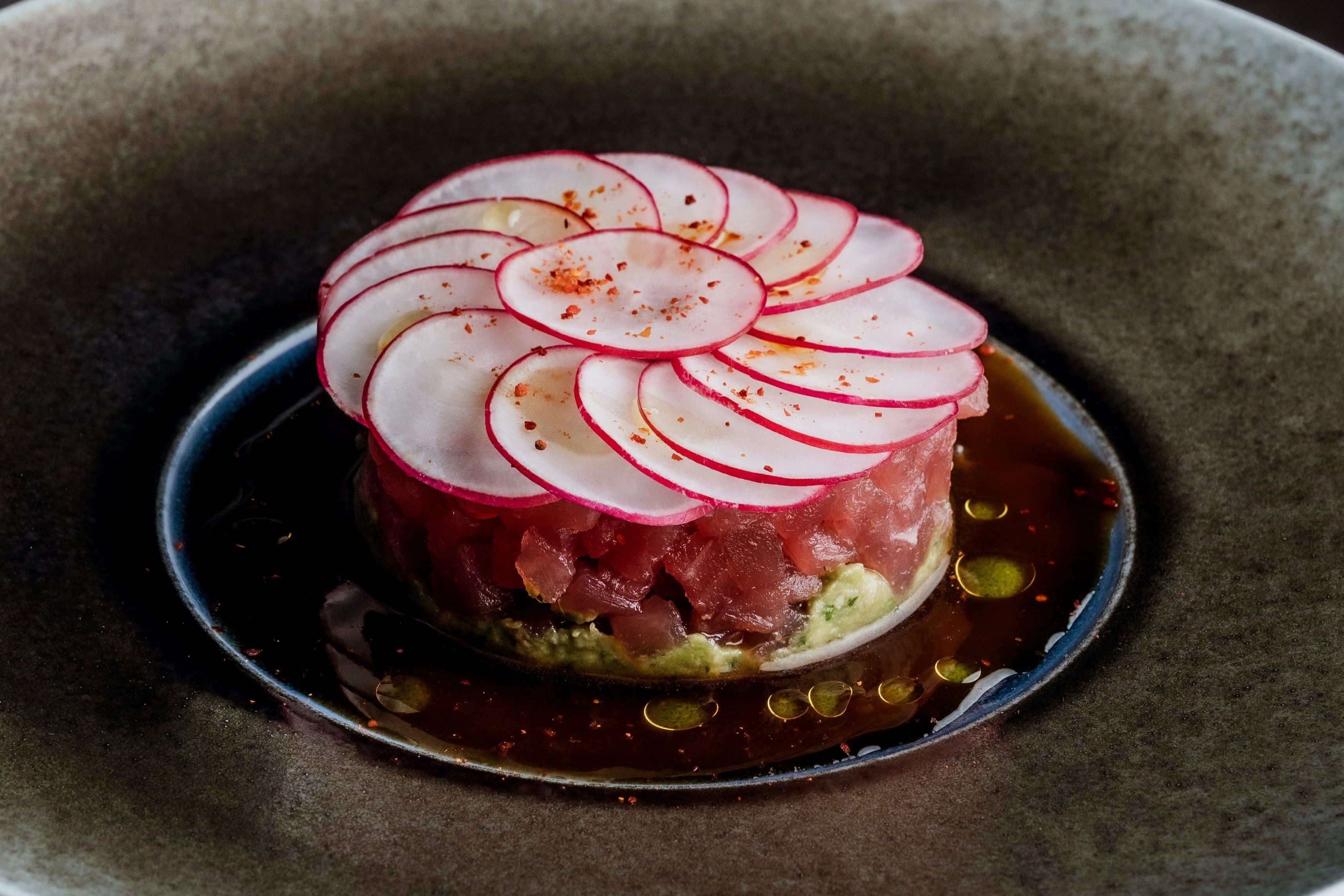 Tuna tartare dish with radish on top