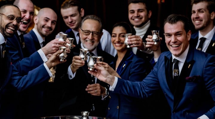 Salvatore and the Velvet bar team cheersing with Champagne