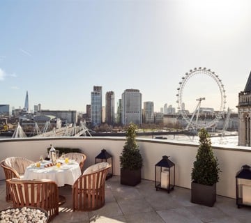 Royal Penthouse terrace with dining area and view of London Eye