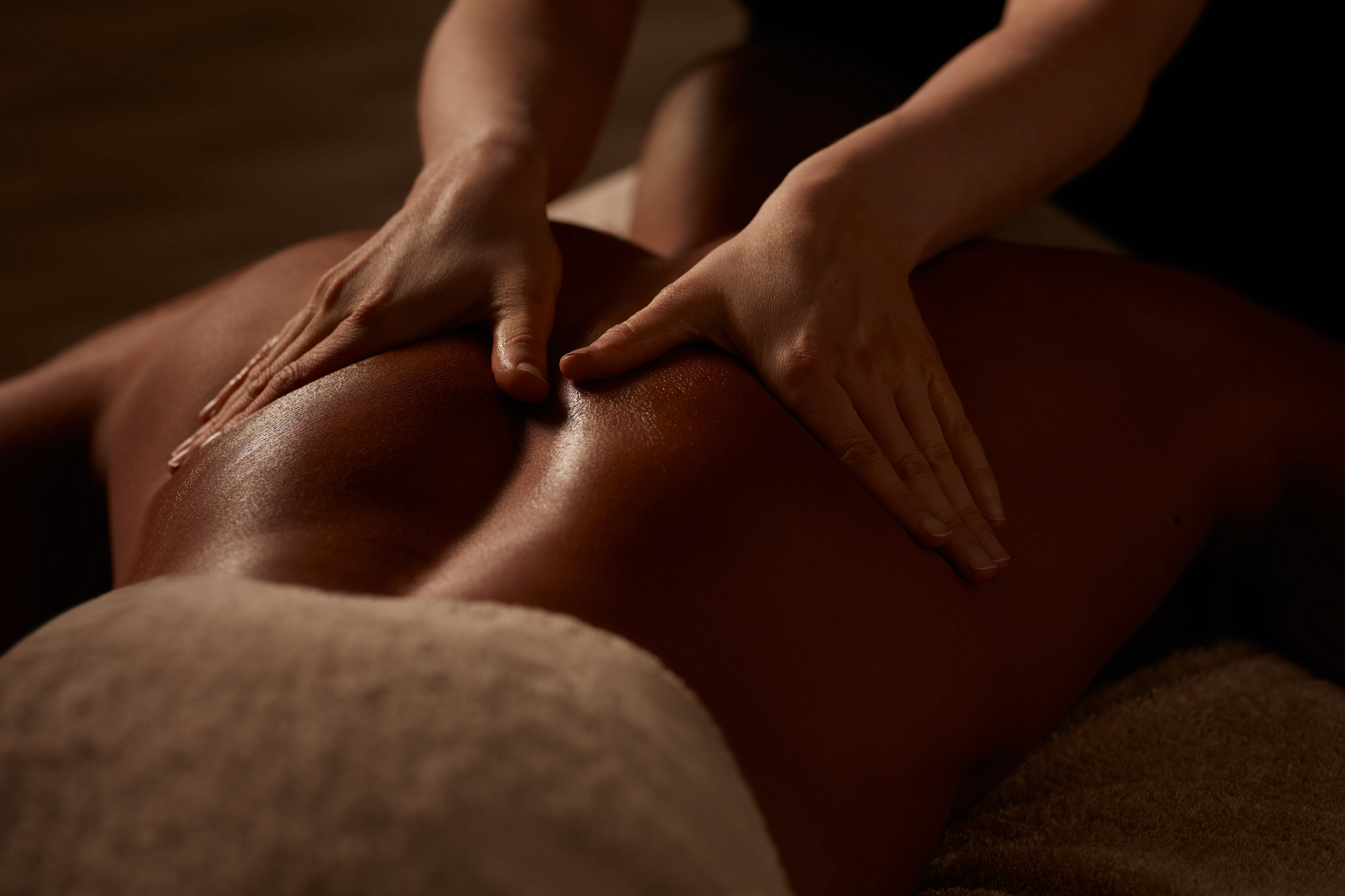Guest enjoying professional back massage therapy at ESPA Life at Corinthia spa near Trafalgar Square, London