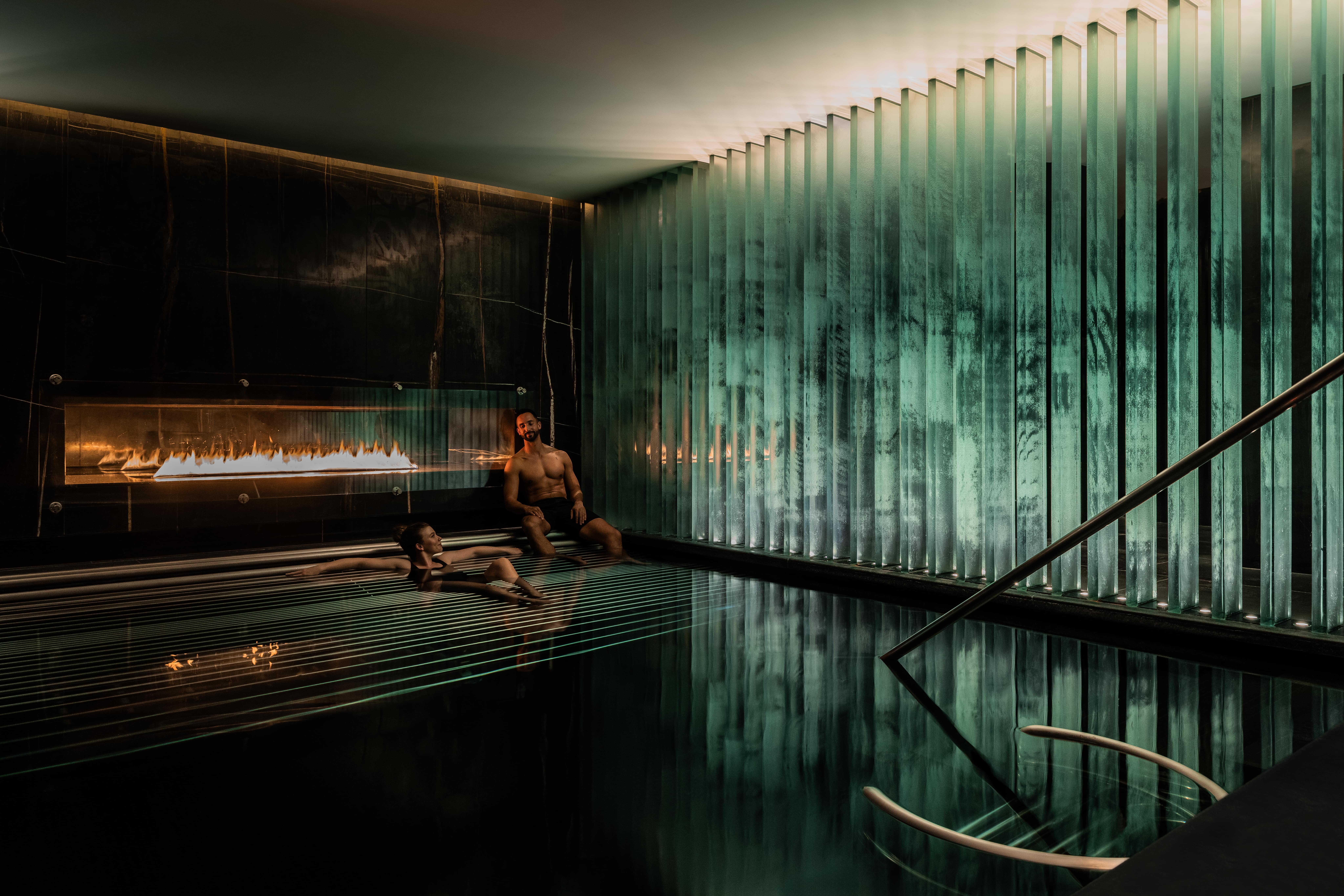 Guests relaxing in the thermal spa facilities, featuring swimming and vitality pools at ESPA Life at Corinthia luxury hotel near Trafalgar Square