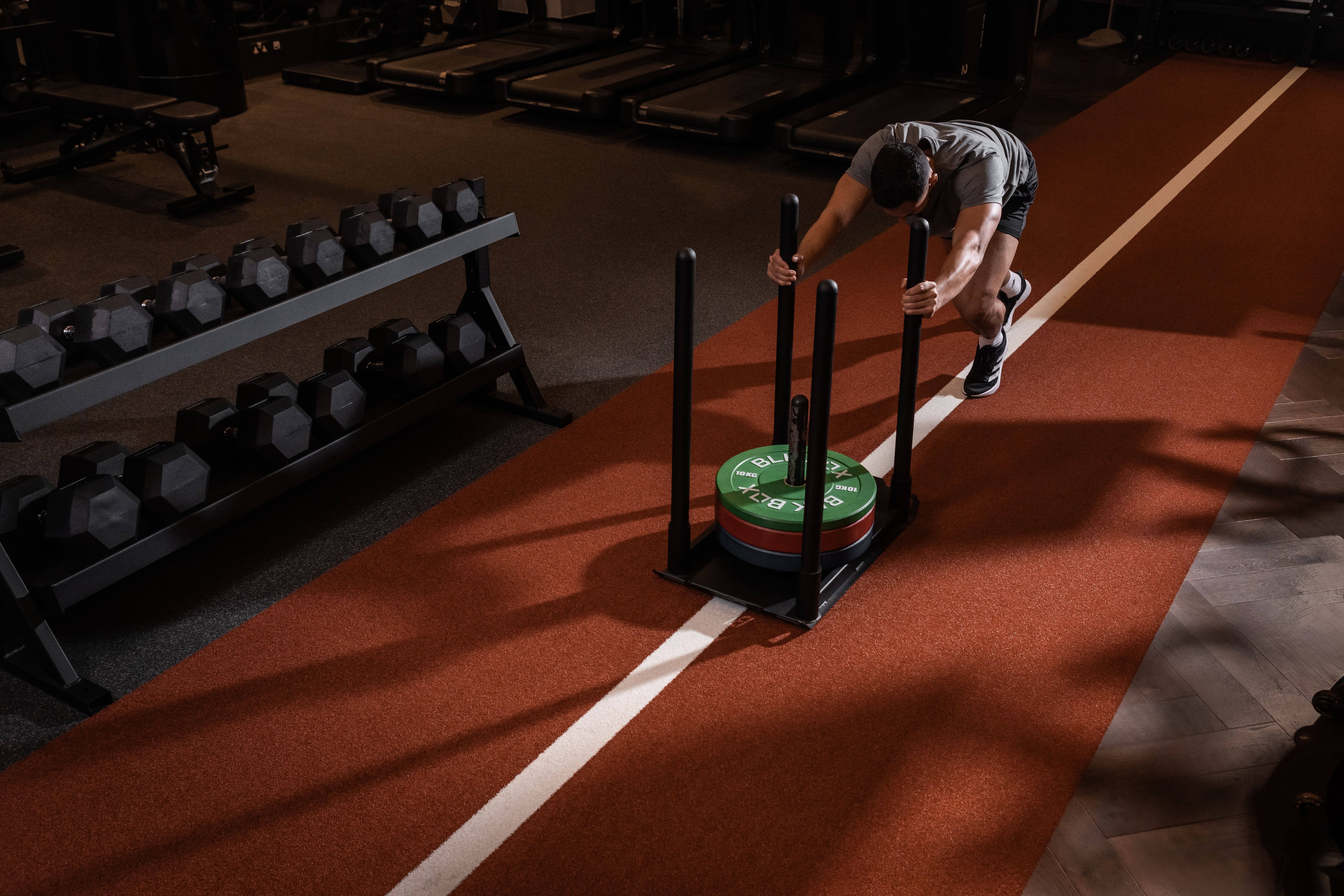 Guest using the state-of-the-art gym at ESPA Life at Corinthia London luxury hotel, in partnership with AMP Fitness