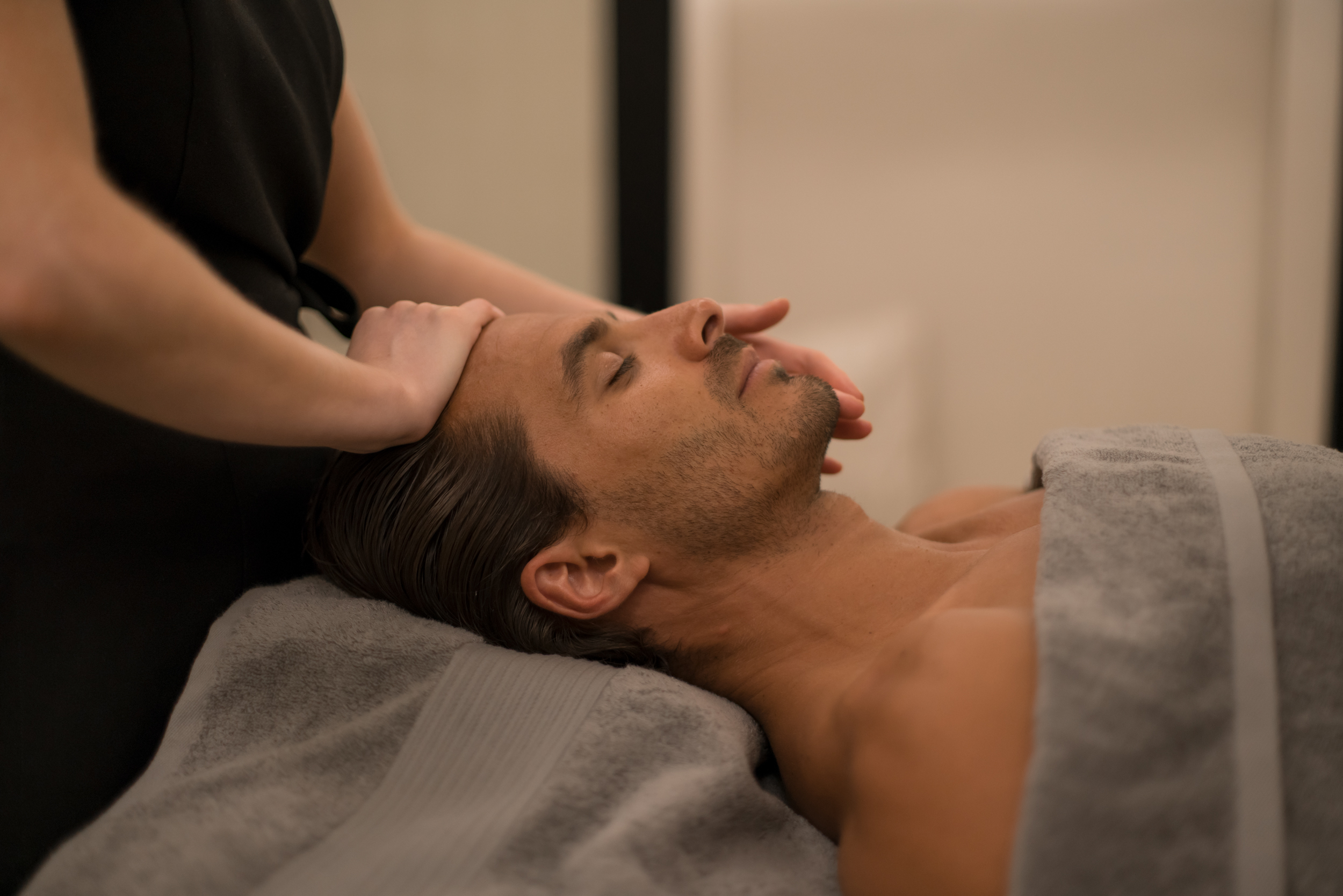 Guest enjoying a therapeutic massage treatment at ESPA Life at Corinthia near Trafalgar Square